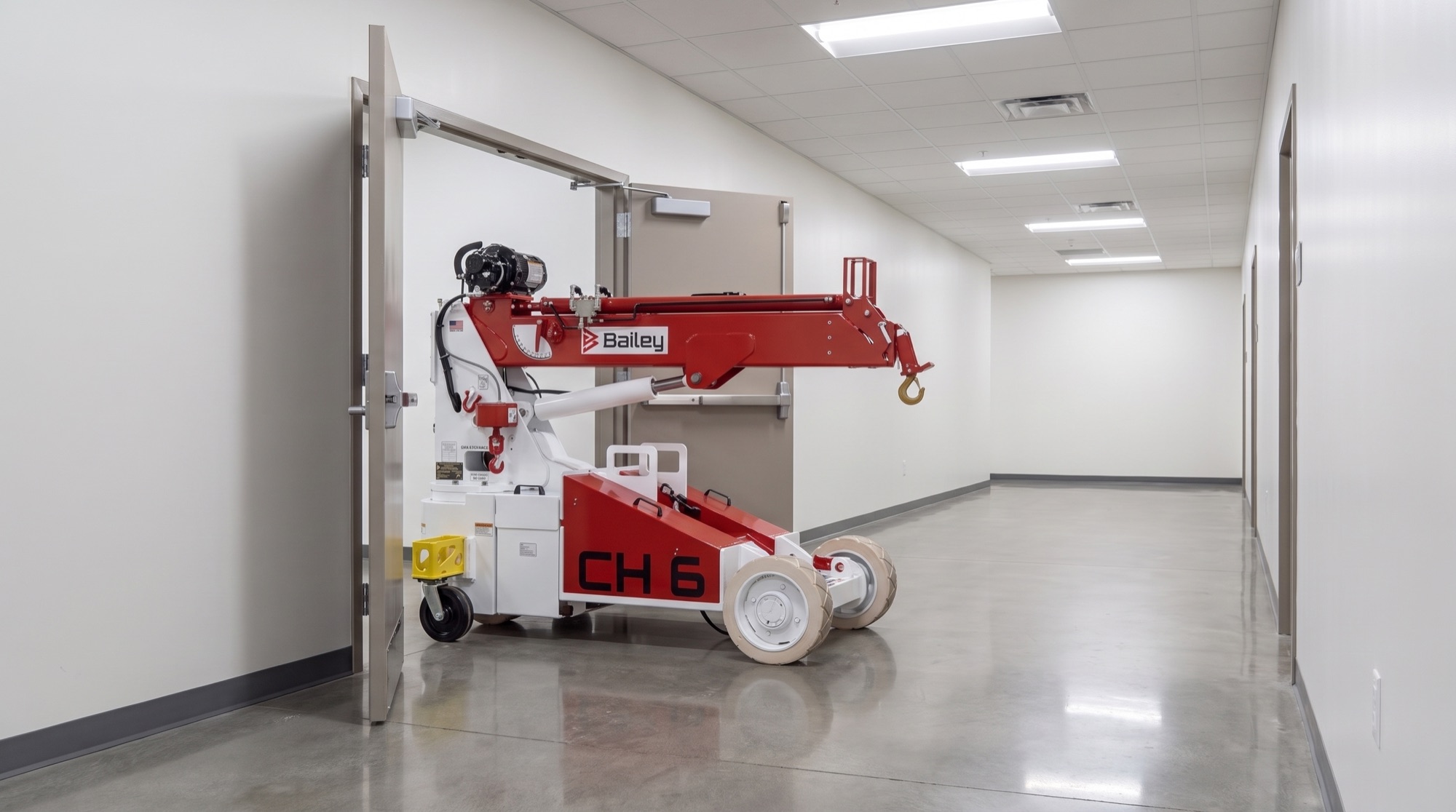 Bailey CH 6 compact handler working inside a finished building interior with its boom raised