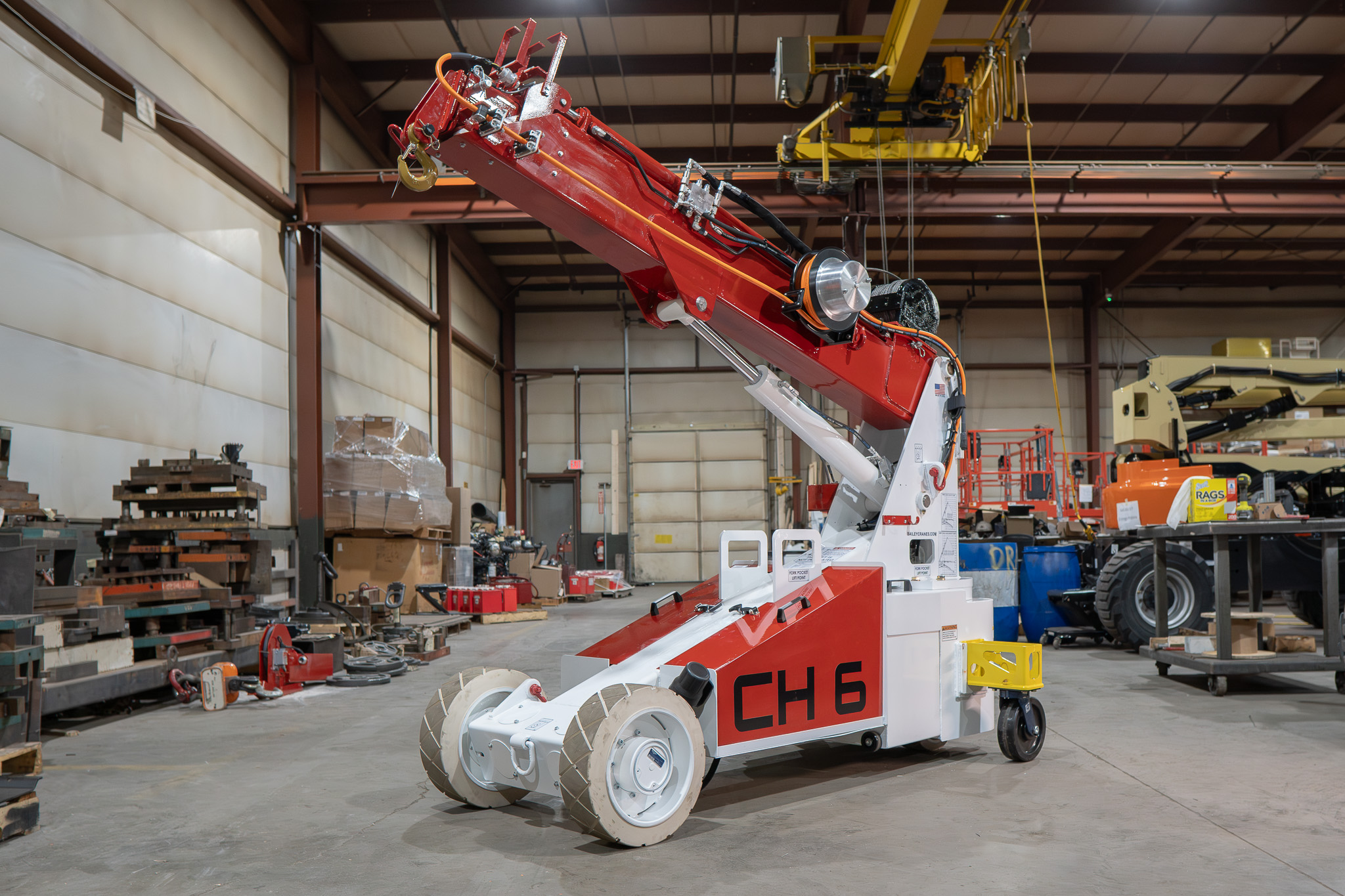 Bailey small mobile crane positioned for an industrial lift in a tight indoor workspace