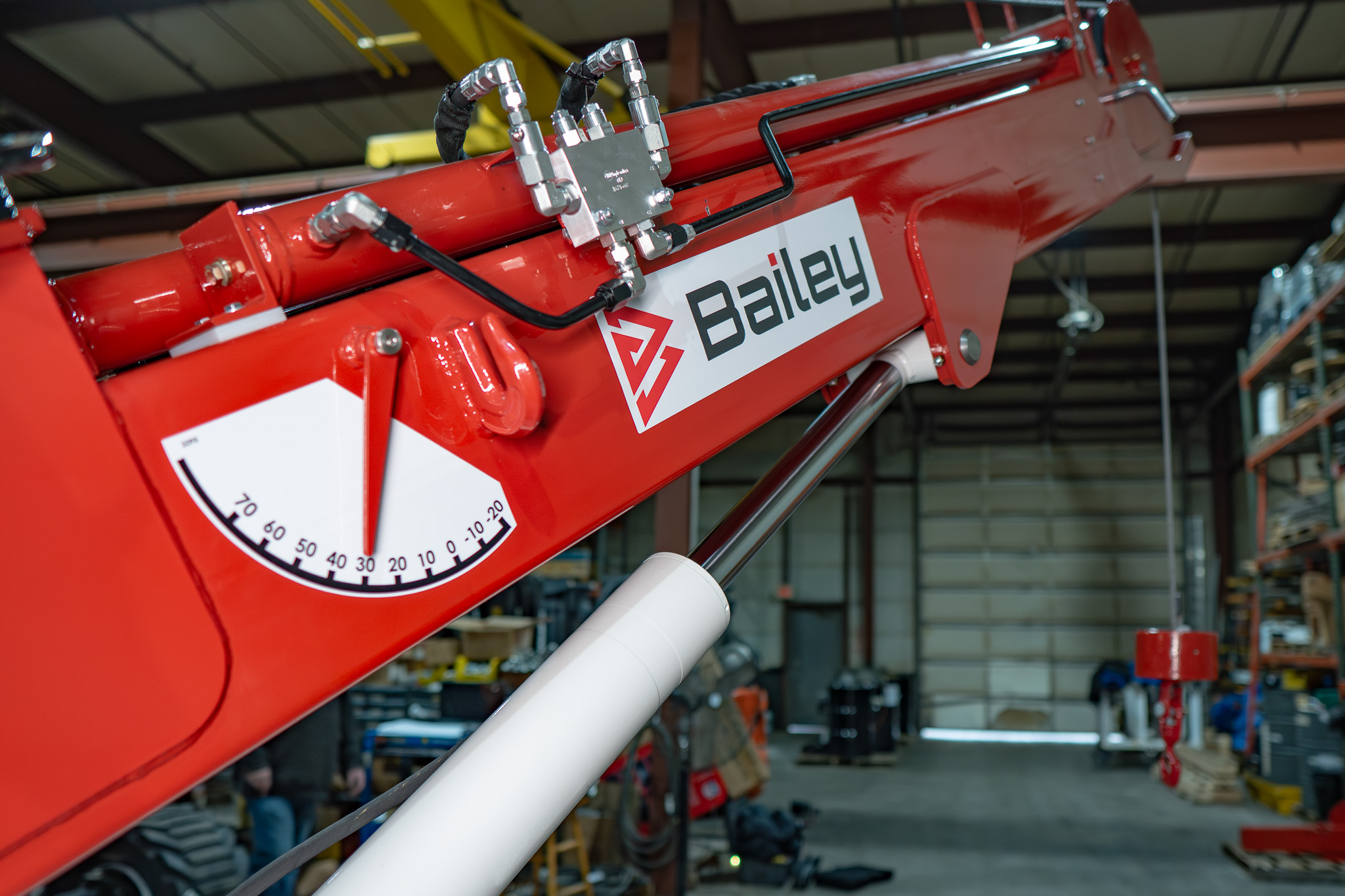 Bailey small mobile crane configured with custom attachment for precision industrial lifting