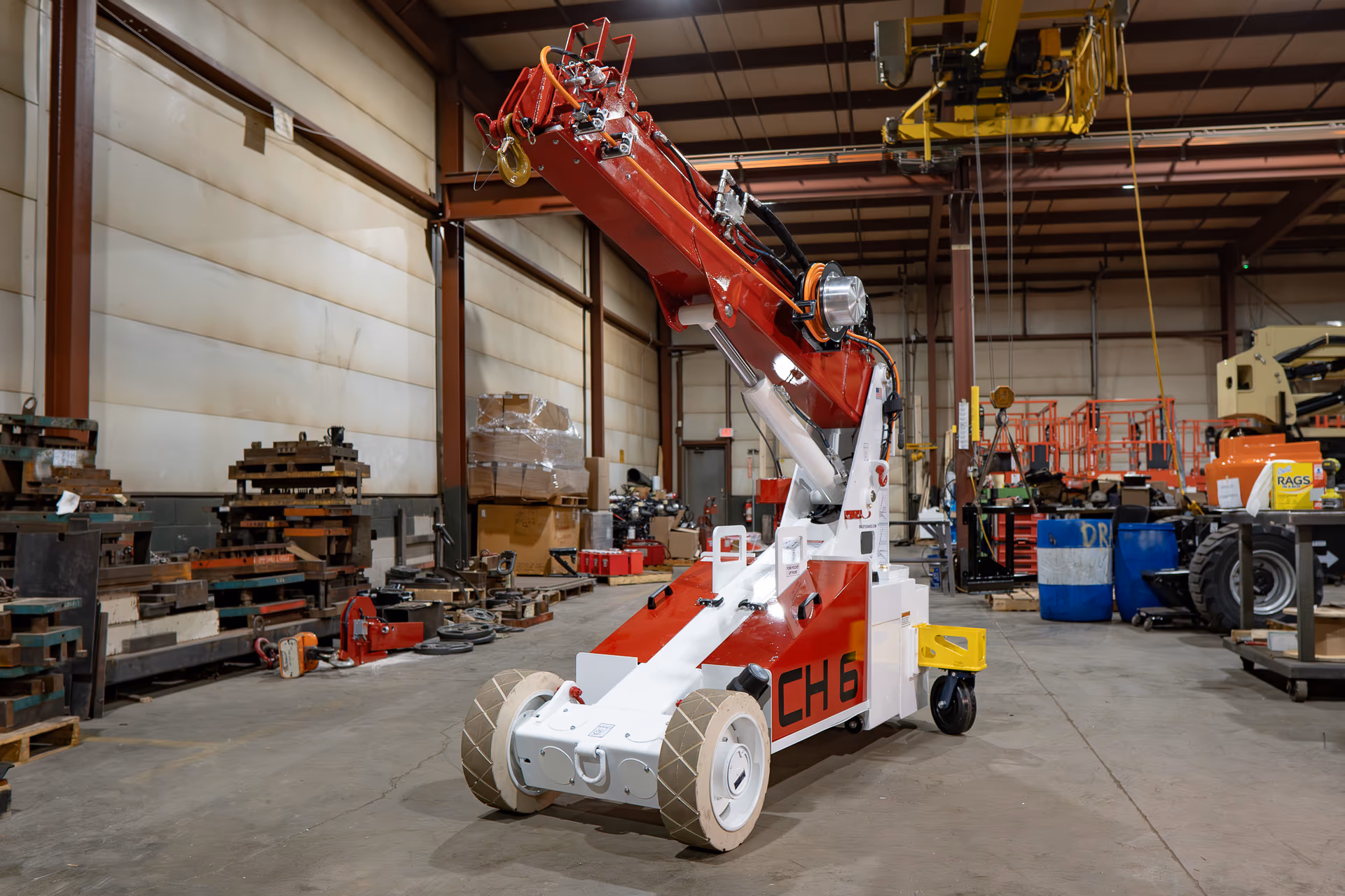 Bailey CH 6 Compact Handler pick-and-carry crane with its telescoping boom raised inside the Bailey workshop