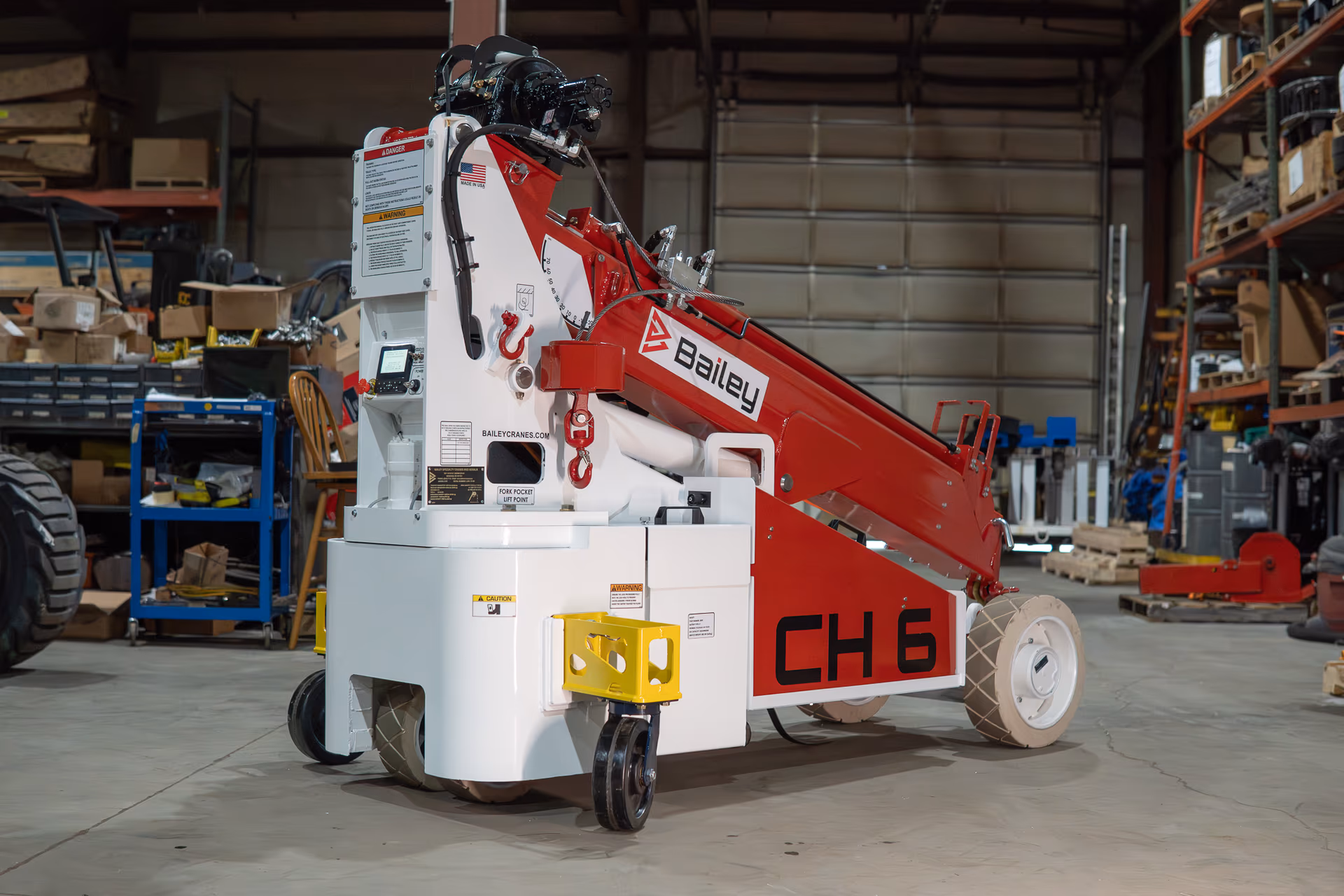 Bailey CH 6 electric pick-and-carry crane with boom extended for indoor machinery lifting