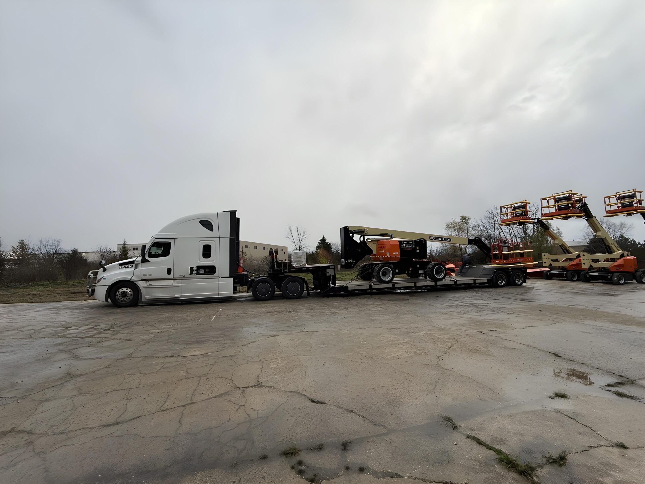 Cranes being delivered on a truck