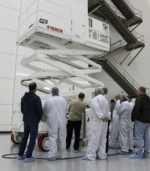 engineers working on a crane