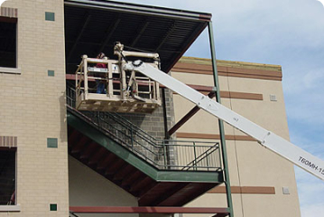 engineer working with the help of a crane